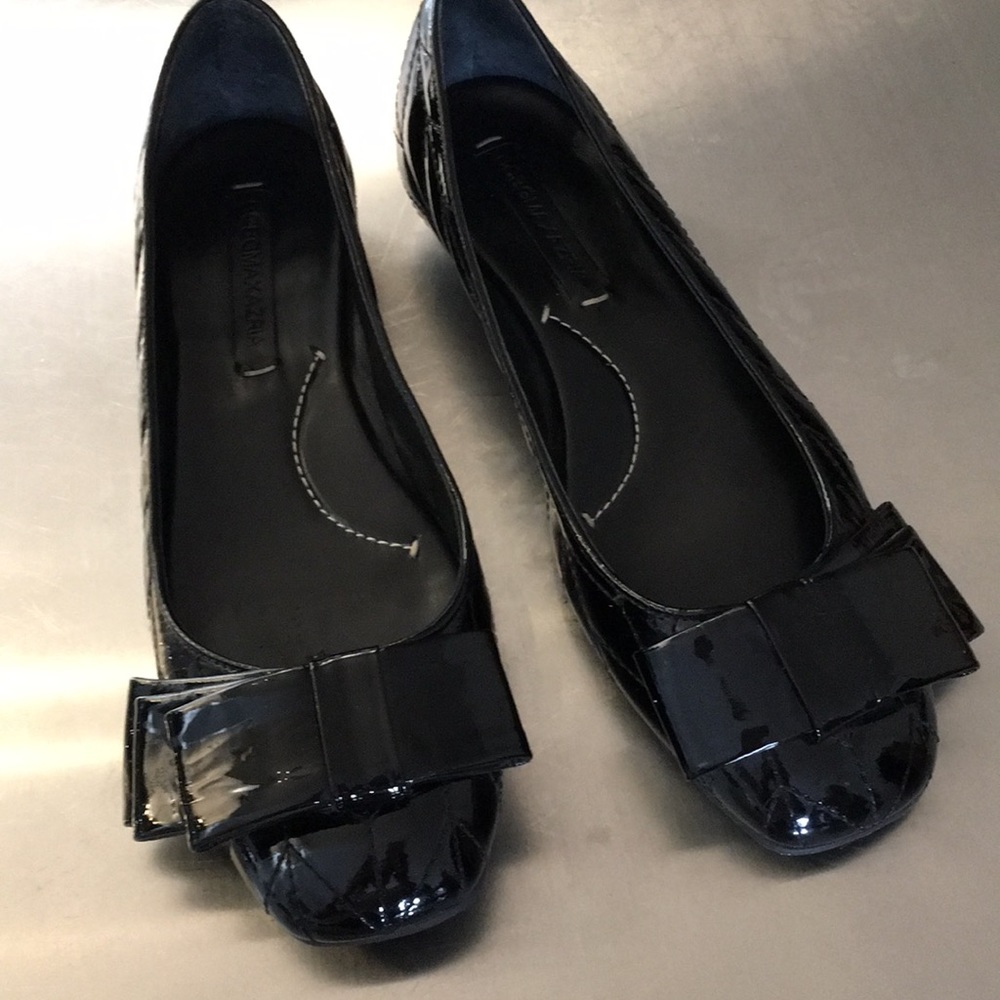 BCBGMaxAzria black patent flats